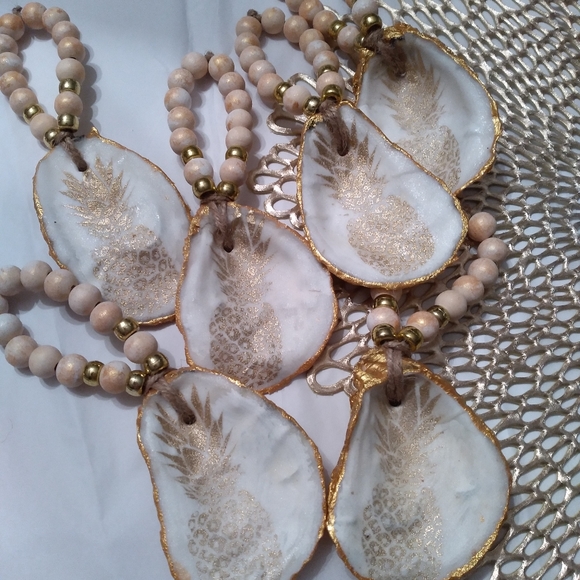 Set of 6. Natural Oyster Shell Napkin Rings - Picture 2 of 4